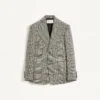 Veste en laine à simple boutonnage avec motif à carreaux sur pied-de-poule Veste en laine à simple boutonnage avec motif à carreaux sur pied-de-poule