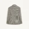 Veste en laine à simple boutonnage avec motif à carreaux sur pied-de-poule Veste en laine à simple boutonnage avec motif à carreaux sur pied-de-poule