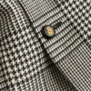 Veste en laine à simple boutonnage avec motif à carreaux sur pied-de-poule Veste en laine à simple boutonnage avec motif à carreaux sur pied-de-poule