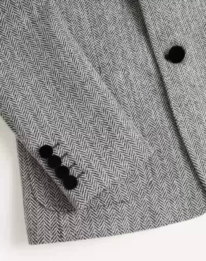 Veste en laine à simple boutonnage et motif chevron Valentino Veste en laine à simple boutonnage et motif chevron Valentino