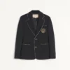 Veste en laine à simple boutonnage Valentino avec patch Valentino Veste en laine à simple boutonnage Valentino avec patch Valentino