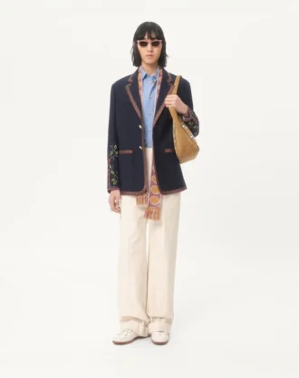 Veste en lin à simple boutonnage avec broderies et empiècements en perles