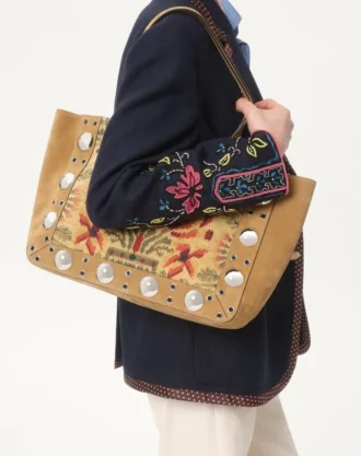 Veste en lin à simple boutonnage avec broderies et empiècements en perles