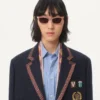 Veste en lin à simple boutonnage avec broderies et empiècements en perles Veste en lin à simple boutonnage avec broderies et empiècements en perles