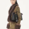 Veste en maille lurex jacquard à imprimé animalier Veste en maille lurex jacquard à imprimé animalier