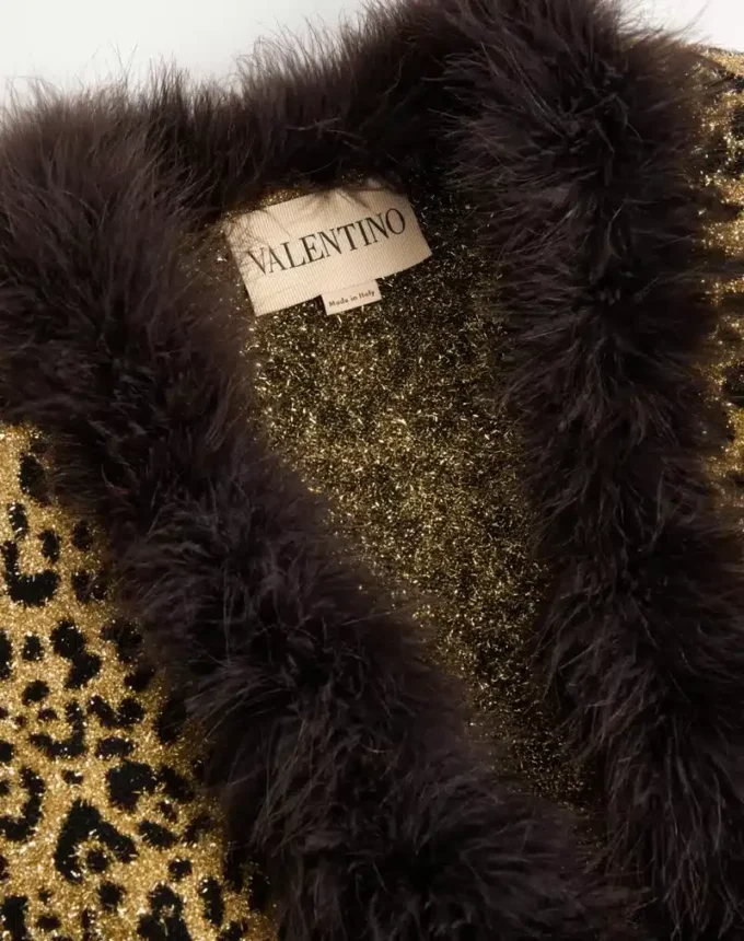 Veste en maille lurex jacquard à imprimé animalier Veste en maille lurex jacquard à imprimé animalier