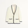 Veste simple boutonnage en laine et coton avec passepoil torchon Veste simple boutonnage en laine et coton avec passepoil torchon