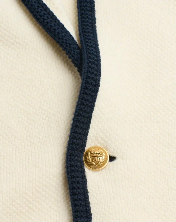 Veste simple boutonnage en laine et coton avec passepoil torchon Veste simple boutonnage en laine et coton avec passepoil torchon