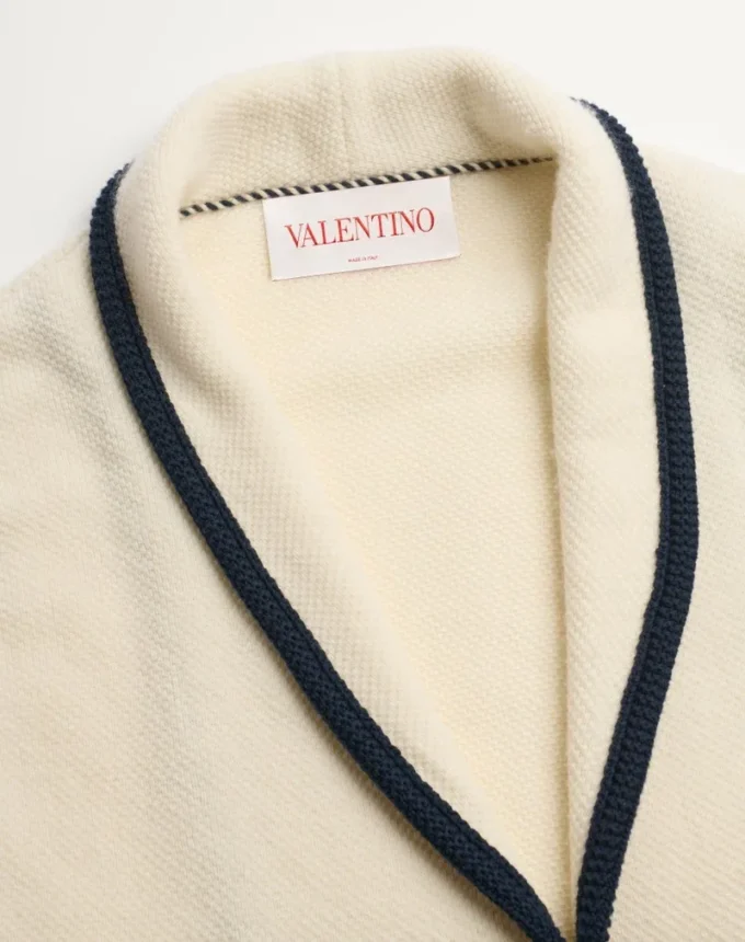 Veste simple boutonnage en laine et coton avec passepoil torchon Veste simple boutonnage en laine et coton avec passepoil torchon